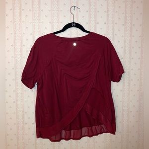 Stylist workout tops in wine red! Multiple sizes available in medium and large.